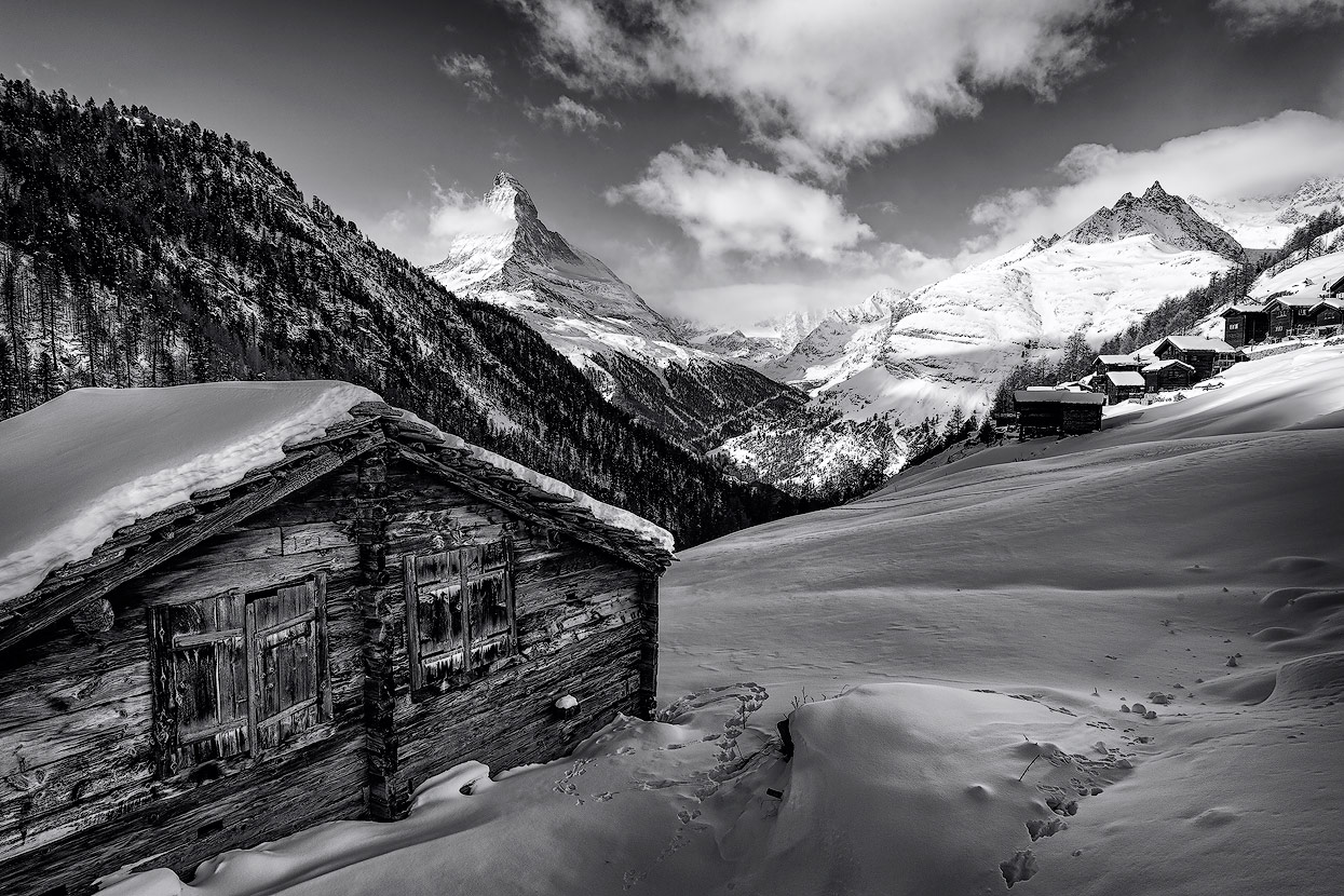 Those wooden huts are a perfect foreground especially when they're covered with snow