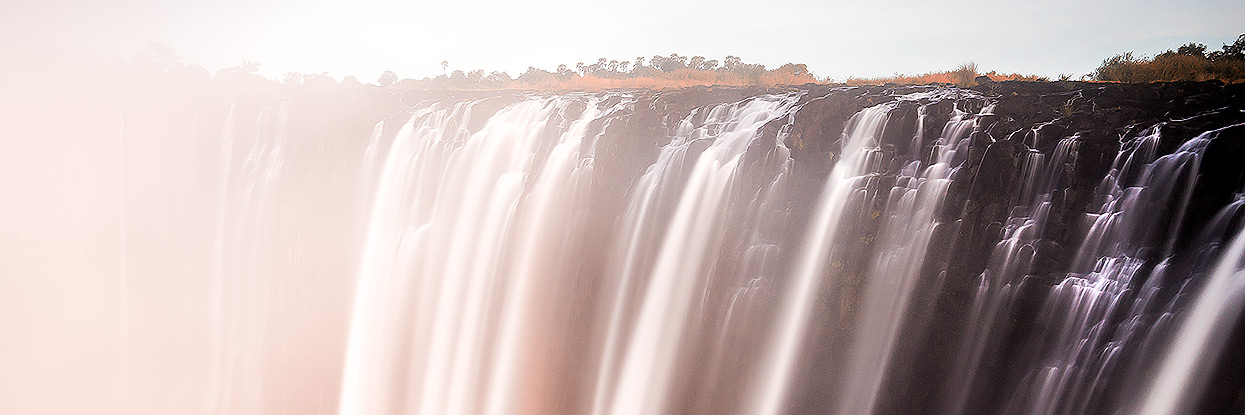 Long exposure sunset shot of Victoria Falls from the Zambian side